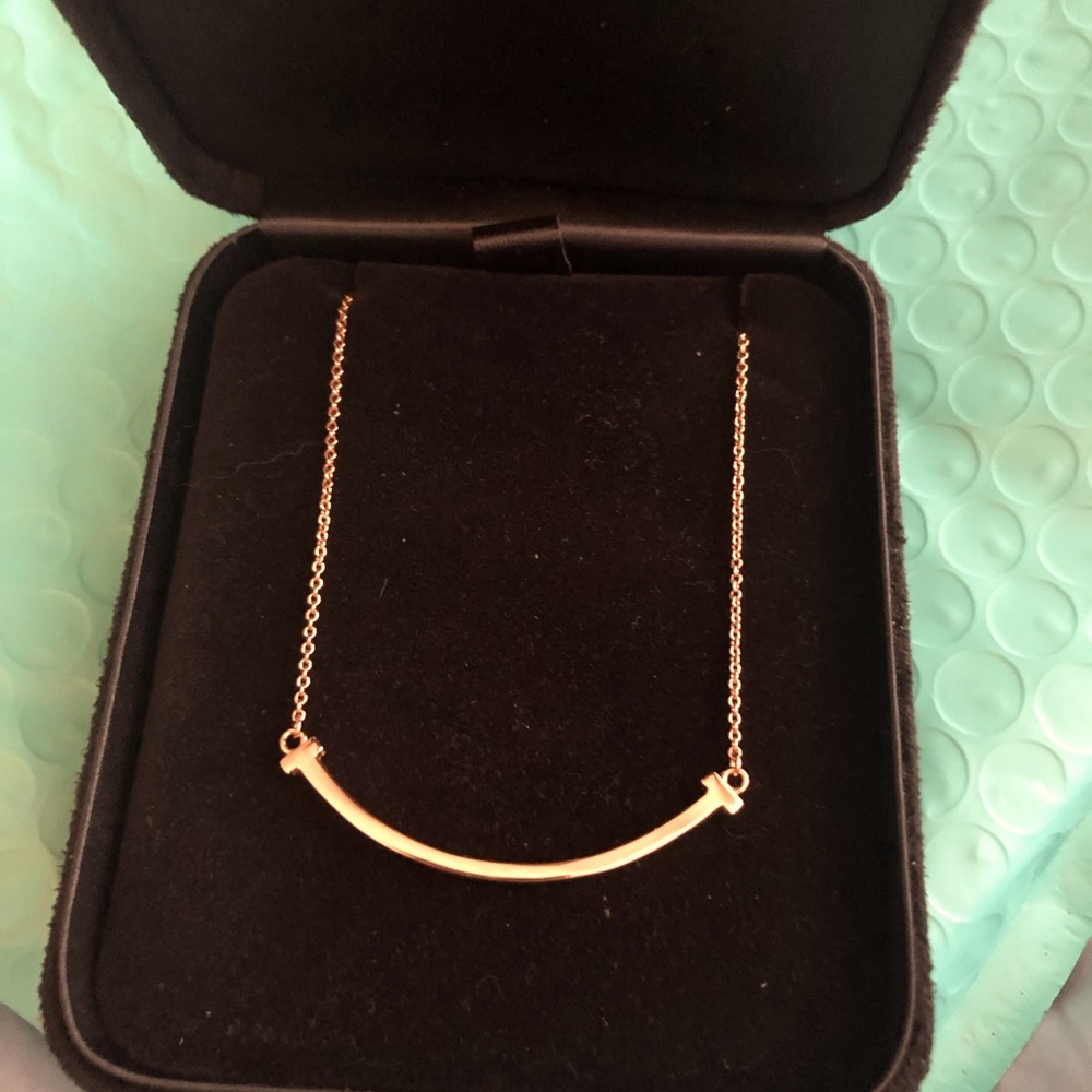 Tiffany & Co, Tiffany T 14K Gold Smile Necklace. Used ones are selling for $1050